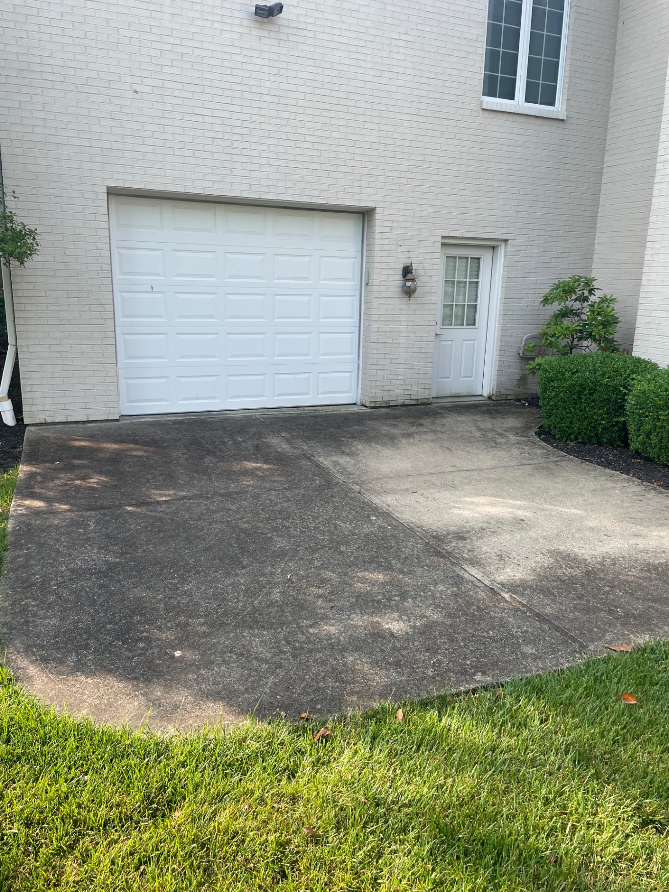 Before garage apron cleaning in Northern Kentucky