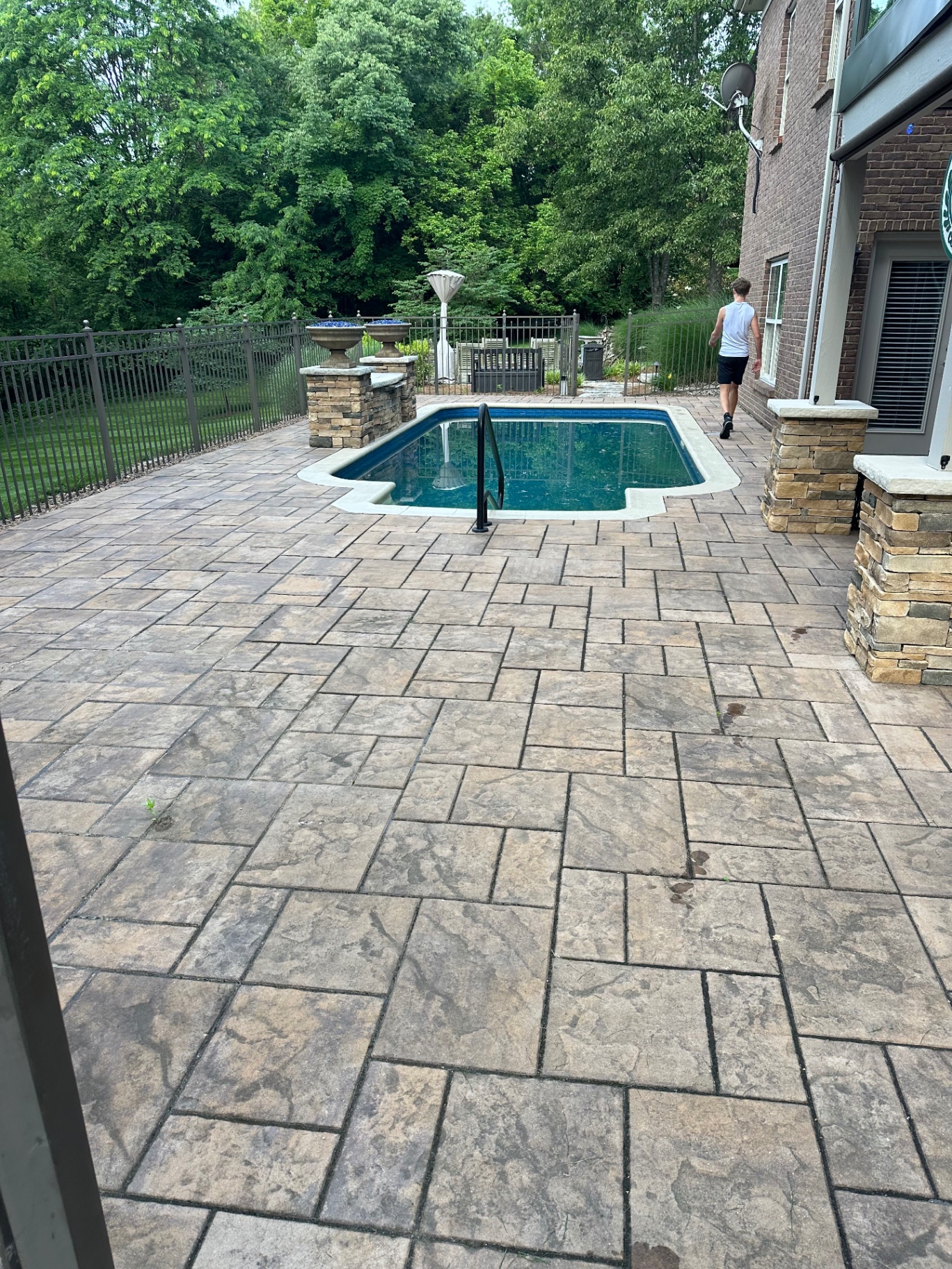 Before paver pool deck cleaning, sand, and seal in Northern Kentucky