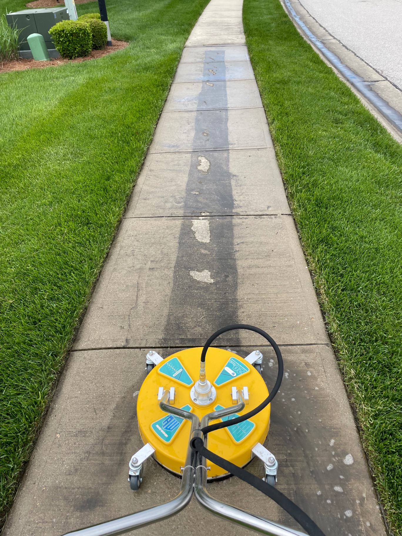 Sidewalk Cleaning In Progress by Revive Exterior in Union, KY