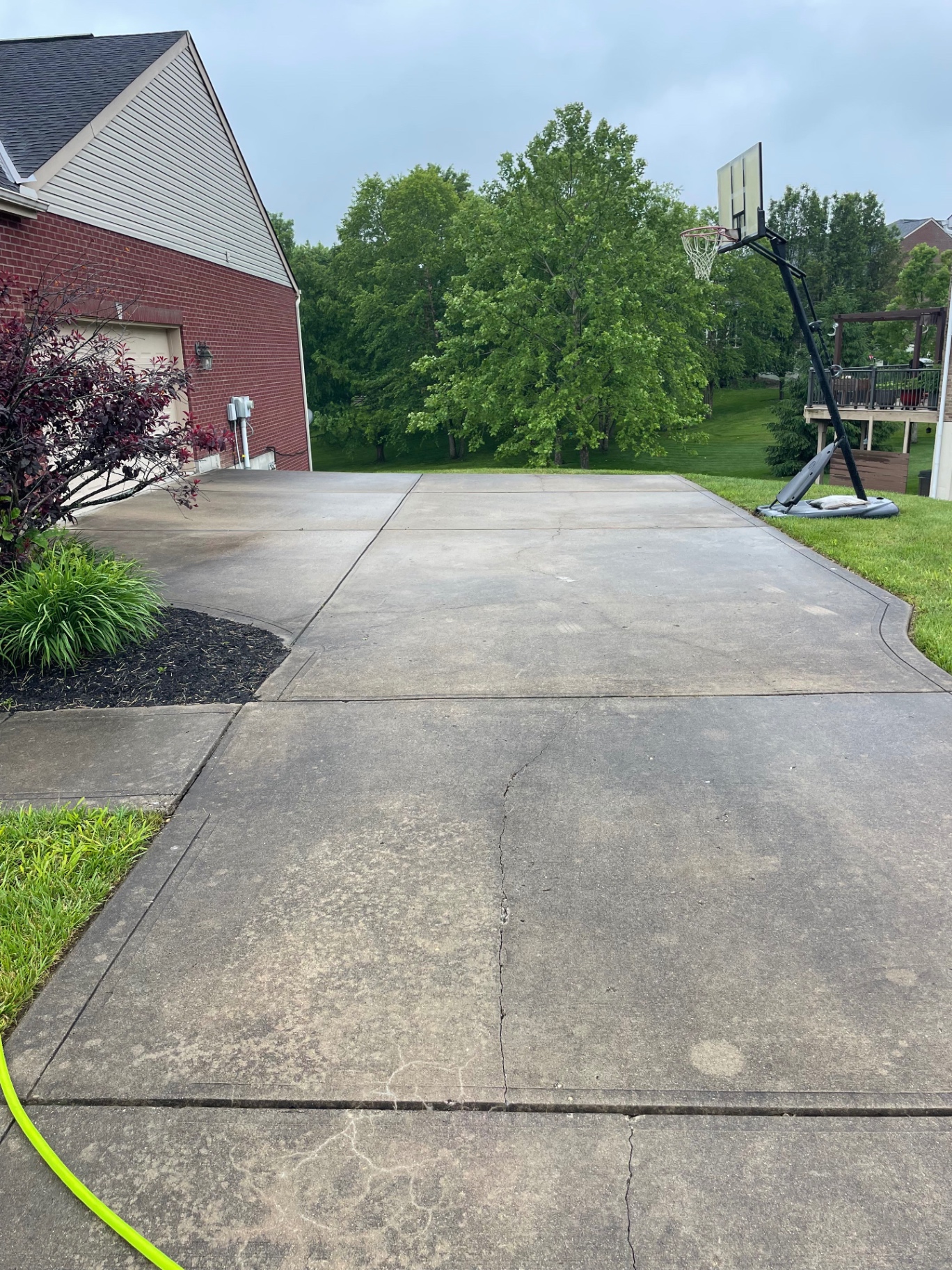 Before driveway & basketball pad in Northern Kentucky